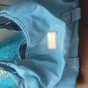 Bright blue leather feel purse